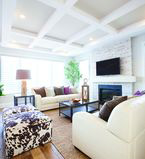 Living room with white columns on the ceiling